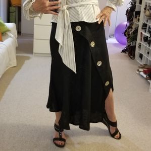 Black asymetrical skirt with large shell buttons - size 2